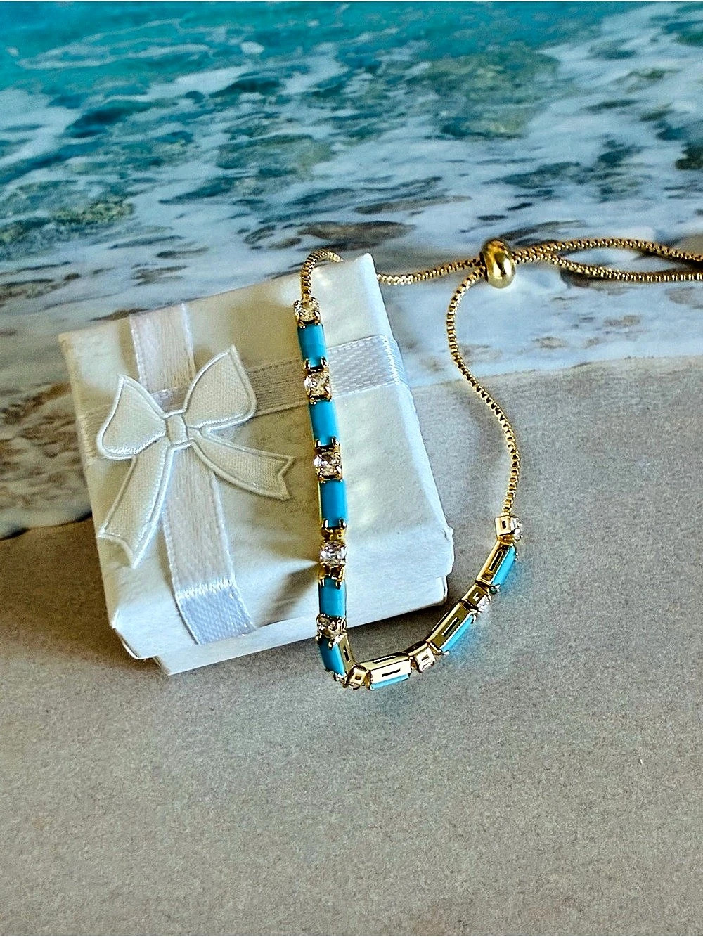 Blue turquoise and gold adjustable bracelet with turquoise and diamond-like ston